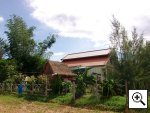 Holiday house front view with garden